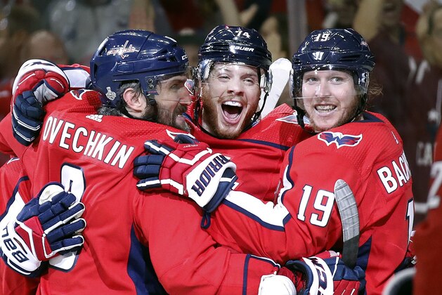Washington Capitals defenseman John Carlson, center, celebrates his goal against the Vegas Golden Knights with Alex Ovechkin, left, of Russia, and Nicklas Backstrom, right, of Sweden, during the second period in Game 4 of the NHL hockey Stanley Cup Final, Monday, June 4, 2018, in Washington. (AP Photo/Alex Brandon) Washington Capitals defenseman John Carlson, center, celebrates his goal against the Vegas Golden Knights with Alex Ovechkin, left, of Russia, and Nicklas Backstrom, right, of Sweden, during the second period in Game 4 of the NHL hockey Stanley Cup Final, Monday, June 4, 2018, in Washington. (AP Photo/Alex Brandon)