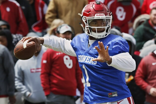 FILE - In this April 14, 2018, file photo, Oklahoma quarterback Kyler Murray (1) passes during an NCAA college football spring intrasquad game in Norman, Okla. Oklahoma’s quarterback competition took an unexpected twist at the Major League Baseball draft. Murray, the favorite to replace Heisman Trophy winner Baker Mayfield this season as Oklahoma’s starter, was selected ninth overall by the Oakland Athletics. (AP Photo/Sue Ogrocki, File)