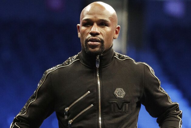 Floyd Mayweather Jr., attends a news conference after a super welterweight boxing match against Conor McGregor, Sunday, Aug. 27, 2017, in Las Vegas. (AP Photo/Isaac Brekken)