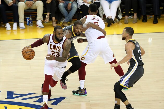 OAKLAND, CA - JUNE 3:  LeBron James #23 of the Cleveland Cavaliers handles the ball against the Golden State Warriors in Game Two of the 2018 NBA Finals on June 3, 2018 at ORACLE Arena in Oakland, California. NOTE TO USER: User expressly acknowledges and agrees that, by downloading and/or using this photograph, user is consenting to the terms and conditions of the Getty Images License Agreement. Mandatory Copyright Notice: Copyright 2018 NBAE (Photo by Joe Murphy/NBAE via Getty Images)
