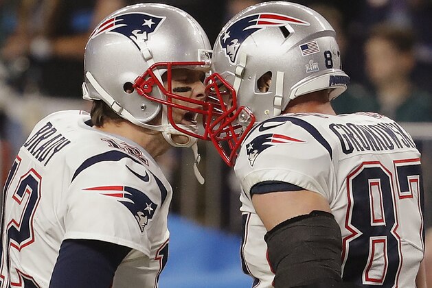 New England Patriots quarterback Tom Brady (12) and tight end Rob Gronkowski (87) celebrate a touchdown play, during the second half of the NFL Super Bowl 52 football game against the Philadelphia Eagles, Sunday, Feb. 4, 2018, in Minneapolis. (AP Photo/Charlie Neibergall)
