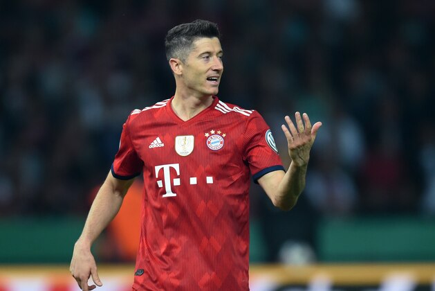 Bayern Munich's Polish striker Robert Lewandowski reacts during the German Cup DFB Pokal final football match FC Bayern Munich vs Eintracht Frankfurt at the Olympic Stadium in Berlin on May 19, 2018. (Photo by Christof STACHE / AFP) / RESTRICTIONS: ACCORDING TO DFB RULES IMAGE SEQUENCES TO SIMULATE VIDEO IS NOT ALLOWED DURING MATCH TIME. MOBILE (MMS) USE IS NOT ALLOWED DURING AND FOR FURTHER TWO HOURS AFTER THE MATCH. == RESTRICTED TO EDITORIAL USE == FOR MORE INFORMATION CONTACT DFB DIRECTLY AT +49 69 67880 /         (Photo credit should read CHRISTOF STACHE/AFP/Getty Images)