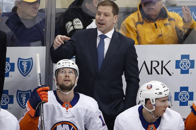 New York Islanders head coach Doug Weight gives instructions during the first period of an NHL hockey game against the Pittsburgh Penguins in Pittsburgh, Saturday, March 3, 2018. (AP Photo/Gene J. Puskar)