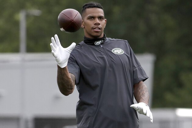 New York Jets wide receiver Terrelle Pryor wears a boot while attending the team's NFL football organized training activities, Tuesday, June 5, 2018, in Florham Park, N.J. (AP Photo/Julio Cortez)