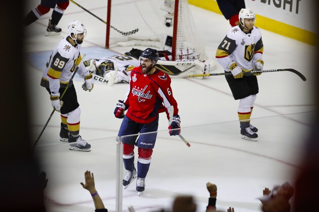 Washington Capitals defenseman Michal Kempny (6), of the Czech Republic, celebrates his goal against Vegas Golden Knights goaltender Marc-Andre Fleury (29) during the third period in Game 4 of the NHL hockey Stanley Cup Final, Monday, June 4, 2018, in Washington. Capitals won 6-2. Skating past Kempny are Vegas Golden Knights forwards Alex Tuch (89) and William Karlsson (71), of Sweden. (AP Photo/Pablo Martinez Monsivais) Washington Capitals defenseman Michal Kempny (6), of the Czech Republic, celebrates his goal against Vegas Golden Knights goaltender Marc-Andre Fleury (29) during the third period in Game 4 of the NHL hockey Stanley Cup Final, Monday, June 4, 2018, in Washington. Capitals won 6-2. Skating past Kempny are Vegas Golden Knights forwards Alex Tuch (89) and William Karlsson (71), of Sweden. (AP Photo/Pablo Martinez Monsivais)