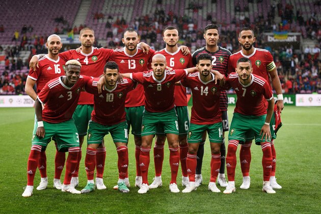 Morroco's national football team (From L) second row, forward Noureddine Amrabat, defender Manuel Da Costa, forward Khalid Boutaib, defender Romain Saiss, goalkeeper Mounir El Kajoui and defender Medhi Amine El Mouttaqi Benatia (Front row), defender Hamza Mendyl, midfielder Younes Belhanda, midfielder Karim El Ahmadi, midfielder M'bark Boussoufa and midfielder Hakim Ziyech pose prior to the friendly football match between Morocco and Ukraine at the Stade de Geneve stadium in Geneva on May 31, 2018 (Photo by Fabrice COFFRINI / AFP)        (Photo credit should read FABRICE COFFRINI/AFP/Getty Images)