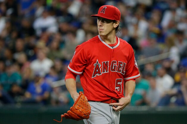 Los Angeles Angels starting pitcher Tim Lincecum pauses on the mound during a baseball game against the Seattle Mariners, Friday, Aug. 5, 2016, in Seattle. (AP Photo/Ted S. Warren)