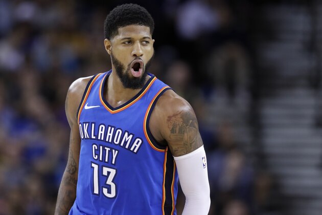 Oklahoma City Thunder's Paul George celebrates after making a 3-point basket against the Golden State Warriors during the second half of an NBA basketball game Tuesday, Feb. 6, 2018, in Oakland, Calif. (AP Photo/Marcio Jose Sanchez)