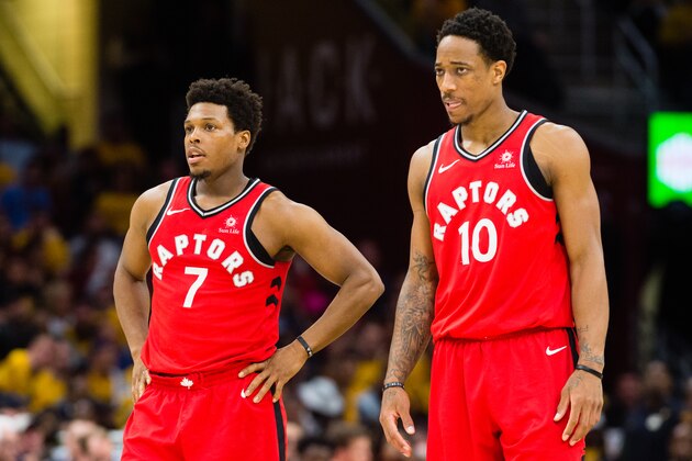 CLEVELAND, OH - MAY 7: Kyle Lowry #7 and DeMar DeRozan #10 of the Toronto Raptors wait for a free-throw during the second half of Game 4 of the second round of the Eastern Conference playoffs against the Cleveland Cavaliers at Quicken Loans Arena on May 7, 2018 in Cleveland, Ohio. The Cavaliers defeated the Raptors 128-93. NOTE TO USER: User expressly acknowledges and agrees that, by downloading and or using this photograph, User is consenting to the terms and conditions of the Getty Images License Agreement. (Photo by Jason Miller/Getty Images)