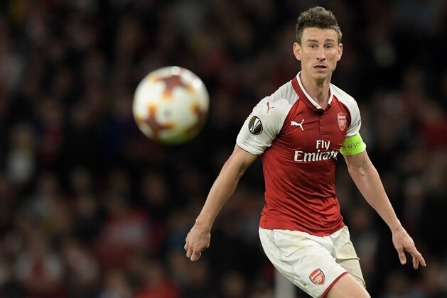 LONDON, ENGLAND - APRIL 26: Laurent Koscielny of Arsenal looks at the ball during the UEFA Europa League Semi Final leg one match between Arsenal FC and Atletico Madrid at Emirates Stadium on April 26, 2018 in London, United Kingdom. (Photo by TF-Images/Getty Images)