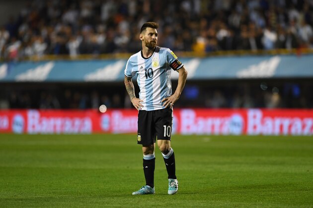 Argentina's Lionel Messi is pictured during the 2018 World Cup qualifier football match against Peru in Buenos Aires on October 5, 2017. / AFP PHOTO / Eitan ABRAMOVICH        (Photo credit should read EITAN ABRAMOVICH/AFP/Getty Images)
