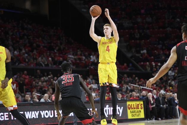 Maryland guard Kevin Huerter (4) shoots against Rutgers guard Issa Thiam (35) during the second half of an NCAA basketball game, Saturday, Feb. 17, 2018, in College Park, Md. Maryland won 61-51. (AP Photo/Nick Wass)