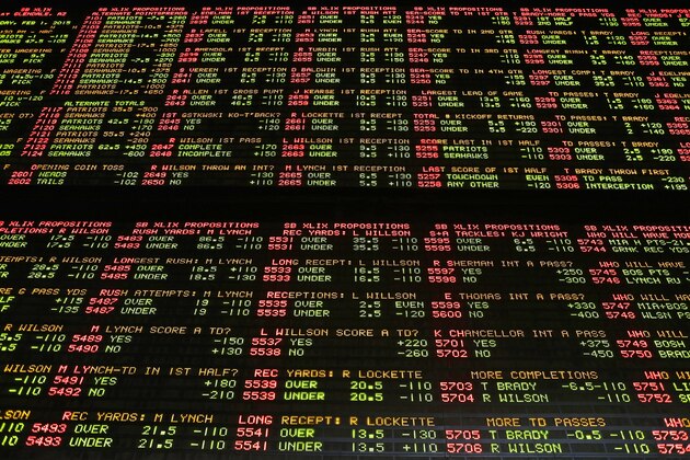 FILE – In this Jan. 27, 2015, file photo, Super Bowl proposition bets are displayed on a board at the Westgate Las Vegas SuperBook race and sports book in Las Vegas. The U.S. Supreme Court is set to hear arguments Dec. 4, 2017, as the state of New Jersey challenges a 1992 law forbidding state-authorized sports gambling in all but four states that met a 1991 deadline to legalize it: Delaware, Montana, Nevada and Oregon. (AP Photo/John Locher, File)