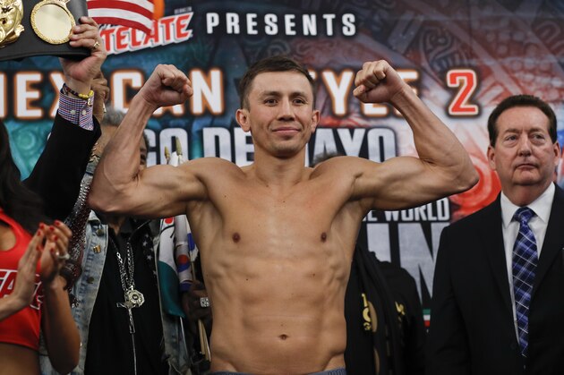 Gennady Golovkin poses for photos during a weigh-in Friday, May 4, 2018, in Los Angeles. Golovkin will defend his middleweight title against Vanes Martirosyan in a boxing match Saturday at StubHub Center in Carson, Calif. (AP Photo/Jae C. Hong)