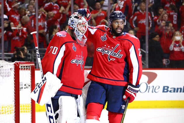 WASHINGTON, DC - JUNE 04:  Braden Holtby #70 and Devante Smith-Pelly #25 of the Washington Capitals celebrate their team's 6-2 win over the Vegas Golden Knights in Game Four of the 2018 NHL Stanley Cup Final at Capital One Arena on June 4, 2018 in Washington, DC.  (Photo by Gregory Shamus/Getty Images)