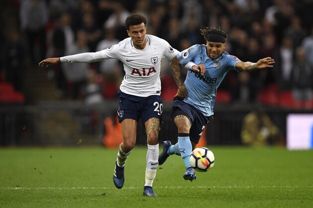 LONDON, ENGLAND - MAY 09:  Dele Alli of Tottenham Hotspur battles for possession with Deandre Yedlin of Newcastle United during the Premier League match between Tottenham Hotspur and Newcastle United at Wembley Stadium on May 9, 2018 in London, England.  (Photo by Stu Forster/Getty Images)