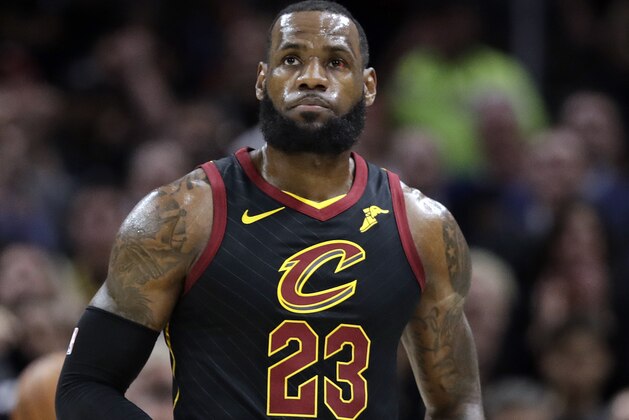 Cleveland Cavaliers' LeBron James looks up at the scoreboard during the first half against the Golden State Warriors in Game 3 of basketball's NBA Finals, Wednesday, June 6, 2018, in Cleveland. (AP Photo/Tony Dejak)