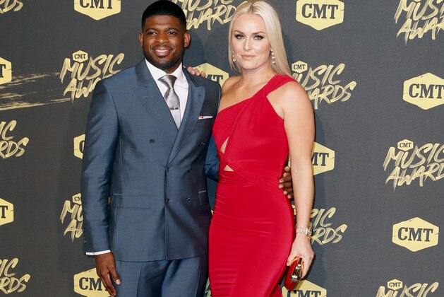 P.K. Subban, left, and Lindsey Vonn arrive at the CMT Music Awards at the Bridgestone Arena on Wednesday, June 6, 2018, in Nashville, Tenn. (AP Photo/Al Wagner)