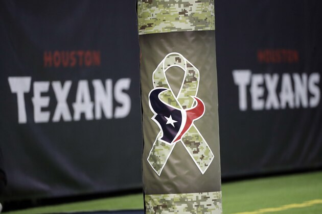 A logo for Salute to Service Day is seen at NRG Stadium before an NFL football game between the Houston Texans and the Indianapolis Colts, Sunday, Nov. 5, 2017, in Houston. (AP Photo/David J. Phillip)