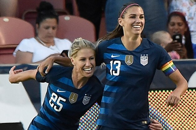 SANDY UT- JUNE 07: McCall Zerboni #25 of the United States celebrates with teammate  Alex Morgan #13 after Morgan's goal in the second half of an international friendly soccer match against China at Rio Tinto Stadium on June 7, 2018 in Sandy, Utah. The United States won 1-0. (Photo by Gene Sweeney Jr/Getty Images)