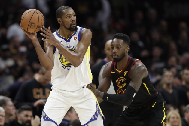Golden State Warriors' Kevin Durant is defended by Cleveland Cavaliers forward Jeff Green (32) in the second half of Game 3 of basketball's NBA Finals, Wednesday, June 6, 2018, in Cleveland. (AP Photo/Tony Dejak) Golden State Warriors' Kevin Durant is defended by Cleveland Cavaliers forward Jeff Green (32) in the second half of Game 3 of basketball's NBA Finals, Wednesday, June 6, 2018, in Cleveland. (AP Photo/Tony Dejak)