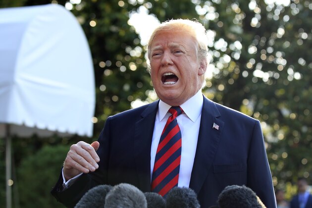 President Donald Trump speaks to reporters before leaving the White House in Washington, Friday, June 8, 2018, to attend the G7 Summit in Charlevoix, Quebec, Canada. (AP Photo/Manuel Balce Ceneta)
