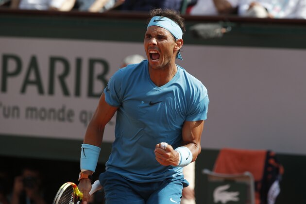 Spain's Rafael Nadal celebrates winning the first set of his semifinal match of the French Open tennis tournament against Argentina's Juan Martin del Potro at the Roland Garros stadium in Paris, France, Friday, June 8, 2018. (AP Photo/Michel Euler)