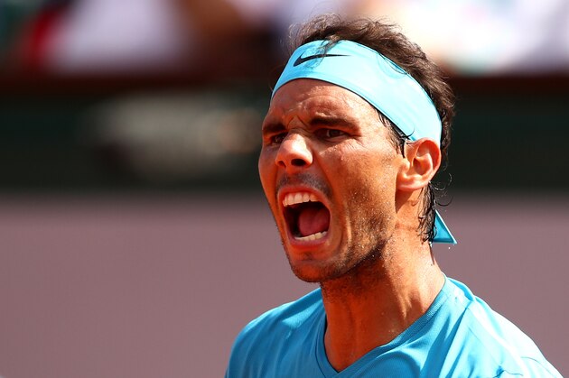 PARIS, FRANCE - JUNE 08:  Rafael Nadal of Spain celebrates during his mens singles semi-final match against Juan Martin Del Potro of Argentina during day thirteen of the 2018 French Open at Roland Garros on June 8, 2018 in Paris, France.  (Photo by Cameron Spencer/Getty Images)