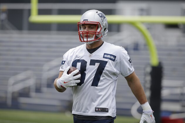 New England Patriots tight end Rob Gronkowski (87) carries the ball during an NFL football minicamp practice, Tuesday, June 5, 2018, in Foxborough, Mass. (AP Photo/Steven Senne)