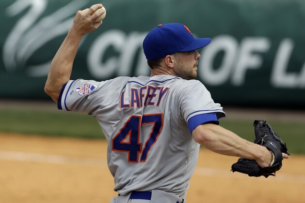 New York Mets relief pitcher Aaron Laffey (47) throws during the eighth inning of an exhibition spring training baseball game against the Detroit Tigers, Monday, March 11, 2013 in Lakeland, Fla. (AP Photo/Carlos Osorio)