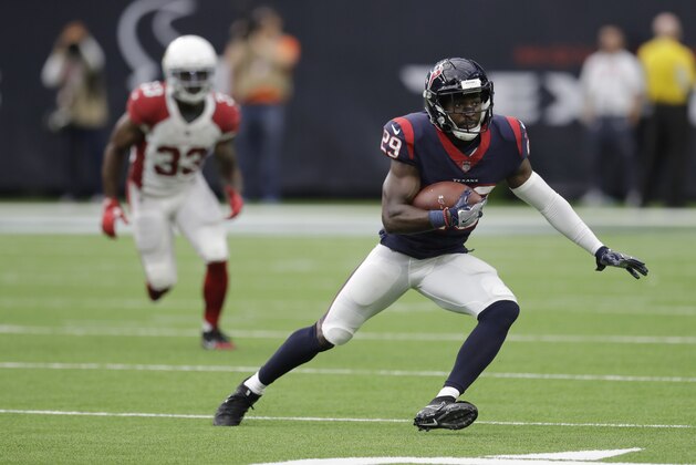 Houston Texans free safety Andre Hal (29) intercepts a pass intended for Arizona Cardinals running back Kerwynn Williams (33) during the second half of an NFL football game Sunday, Nov. 19, 2017, in Houston. (AP Photo/David J. Phillip)