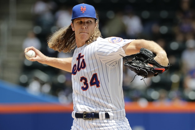 New York Mets' Noah Syndergaard delivers a pitch during the first inning of a baseball game against the Arizona Diamondbacks, Sunday, May 20, 2018, in New York. (AP Photo/Frank Franklin II)