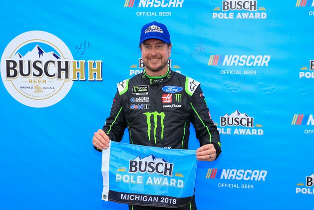 BROOKLYN, MI - JUNE 08:  Kurt Busch, driver of the #41 Monster Energy/Haas Automation Ford, poses with the Busch Pole Award after qualifying for the pole position for the Monster Energy NASCAR Cup Series Firekeepers Casino 400 at Michigan International Speedway on June 8, 2018 in Brooklyn, Michigan.  (Photo by Daniel Shirey/Getty Images)