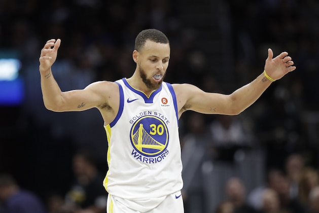 Golden State Warriors' Stephen Curry celebrates in the second half of Game 4 of basketball's NBA Finals against the Cleveland Cavaliers, Friday, June 8, 2018, in Cleveland. (AP Photo/Tony Dejak)