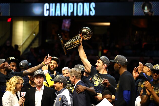CLEVELAND, OH - JUNE 08:  Zaza Pachulia #27 of the Golden State Warriors celebrates with the Larry O'Brien Trophy after defeating the Cleveland Cavaliers during Game Four of the 2018 NBA Finals at Quicken Loans Arena on June 8, 2018 in Cleveland, Ohio. The Warriors defeated the Cavaliers 108-85 to win the 2018 NBA Finals. NOTE TO USER: User expressly acknowledges and agrees that, by downloading and or using this photograph, User is consenting to the terms and conditions of the Getty Images License Agreement.  (Photo by Gregory Shamus/Getty Images)