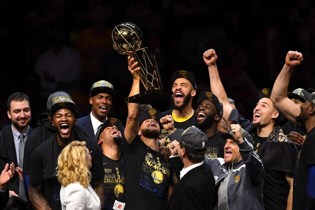 CLEVELAND, OH - JUNE 08:  Stephen Curry #30 of the Golden State Warriors celebrates with the Larry O'Brien Trophy after defeating the Cleveland Cavaliers in Game Four of the 2018 NBA Finals at Quicken Loans Arena on June 8, 2018 in Cleveland, Ohio. NOTE TO USER: User expressly acknowledges and agrees that, by downloading and or using this photograph, User is consenting to the terms and conditions of the Getty Images License Agreement.  (Photo by Jason Miller/Getty Images)