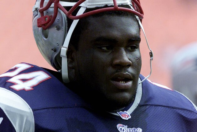 07 Oct 2001:  Kenyatta Jones of the New England Patriots rests on the sideline during the game against the Miami Dolphins at Pro Player Stadium in Miami, Florida. The Dolphins defeated the Patriots 30-10. DIGITAL IMAGE. Mandatory Credit: Eliot Schechter/Allsport