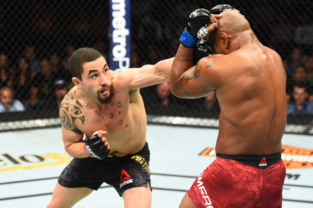 CHICAGO, ILLINOIS - JUNE 09:  (L-R) Robert Whittaker of New Zealand punches Yoel Romero of Cuba in their middleweight fight during the UFC 225 event at the United Center on June 9, 2018 in Chicago, Illinois. (Photo by Josh Hedges/Zuffa LLC/Zuffa LLC via Getty Images)