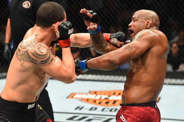 CHICAGO, ILLINOIS - JUNE 09:  (L-R) Robert Whittaker of New Zealand punches Yoel Romero of Cuba in their middleweight fight during the UFC 225 event at the United Center on June 9, 2018 in Chicago, Illinois. (Photo by Josh Hedges/Zuffa LLC/Zuffa LLC via Getty Images)