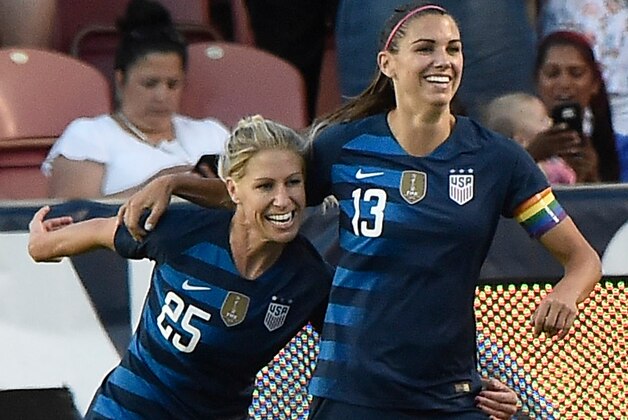 SANDY UT- JUNE 07: McCall Zerboni #25 of the United States celebrates with teammate  Alex Morgan #13 after Morgan's goal in the second half of an international friendly soccer match against China at Rio Tinto Stadium on June 7, 2018 in Sandy, Utah. The United States won 1-0. (Photo by Gene Sweeney Jr/Getty Images)