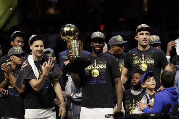 Golden State Warriors' Draymond Green celebrates after the Warriors defeated the Cleveland Cavaliers 108-85 in Game 4 of basketball's NBA Finals to win the NBA championship, Friday, June 8, 2018, in Cleveland. (AP Photo/Tony Dejak)