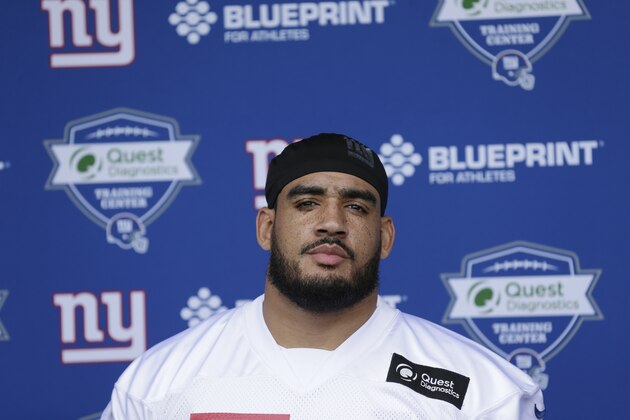 New York Giants' Olivier Vernon speaks to reporters before a NFL football training camp in East Rutherford, N.J., Tuesday, April 24, 2018. (AP Photo/Seth Wenig)