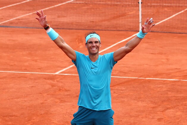 PARIS, FRANCE - JUNE 10:  Rafael Nadal of Spain celebrates victory following the mens singles final against Dominic Thiem of Austria during day fifteen of the 2018 French Open at Roland Garros on June 10, 2018 in Paris, France.  (Photo by Clive Brunskill/Getty Images)