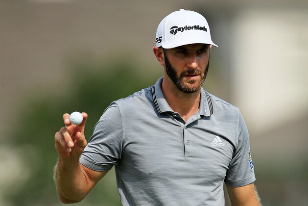 MEMPHIS, TN - JUNE 09:  Dustin Johnson waves to the crowd after making a birdie putt on the 16th green during the third round of the FedEx St. Jude Classic at TPC Southwind on June 9, 2018 in Memphis, Tennessee.  (Photo by Andy Lyons/Getty Images)