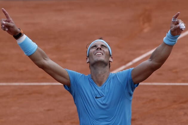 Spain's Rafael Nadal celebrates winning the men's final match of the French Open tennis tournament against Austria's Dominic Thiem in three sets 6-4, 6-3, 6-2, at the Roland Garros stadium in Paris, France, Sunday, June 10, 2018. (AP Photo/Michel Euler)