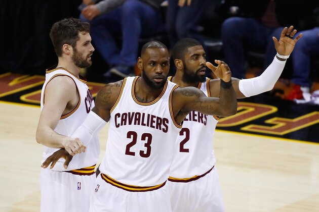 CLEVELAND, OH - JUNE 09: Kevin Love #0, LeBron James #23 and Kyrie Irving #2 of the Cleveland Cavaliers react after a play in the first quarter against the Golden State Warriors in Game 4 of the 2017 NBA Finals at Quicken Loans Arena on June 9, 2017 in Cleveland, Ohio. NOTE TO USER: User expressly acknowledges and agrees that, by downloading and or using this photograph, User is consenting to the terms and conditions of the Getty Images License Agreement.  (Photo by Gregory Shamus/Getty Images)