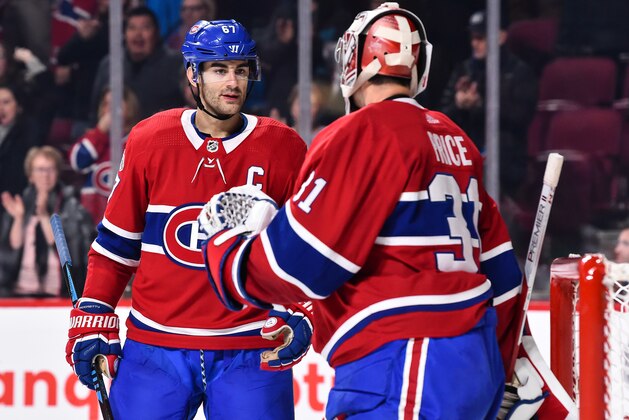 MONTREAL, QC - DECEMBER 02:  Max Pacioretty #67 of the Montreal Canadiens congratulates goaltender Carey Price #31 on their victory against the Detroit Red Wings during the NHL game at the Bell Centre on December 2, 2017 in Montreal, Quebec, Canada.  The Montreal Canadiens defeated the Detroit Red Wings 10-1.  (Photo by Minas Panagiotakis/Getty Images)