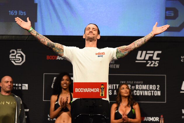 CHICAGO, ILLINOIS - JUNE 08:  CM Punk poses on the scale during the UFC 225 weigh-in at the United Center on June 8, 2018 in Chicago, Illinois. (Photo by Josh Hedges/Zuffa LLC/Zuffa LLC via Getty Images)