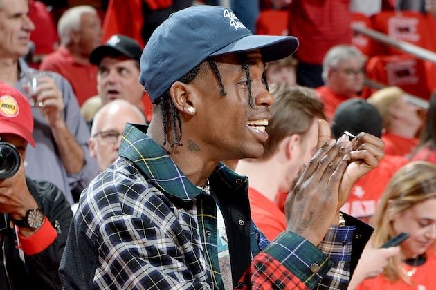 HOUSTON, TX - MAY 28: Travis Scott attends the game between the Golden State Warriors and the Houston Rockets during Game Seven of the Western Conference Finals of the 2018 NBA Playoffs on May 28, 2018 at the Toyota Center in Houston, Texas. NOTE TO USER: User expressly acknowledges and agrees that, by downloading and or using this photograph, User is consenting to the terms and conditions of the Getty Images License Agreement. Mandatory Copyright Notice: Copyright 2018 NBAE (Photo by Andrew D. Bernstein/NBAE via Getty Images)