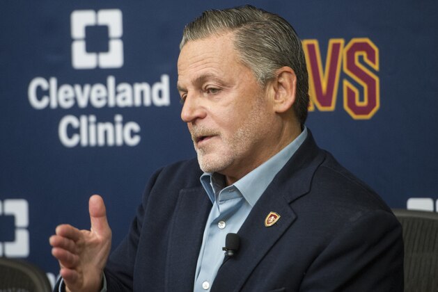 Cleveland Cavaliers chairman Dan Gilbert answers a question about Cavalier player Kyrie Irving's demand to be traded, during a news conference at the Cavaliers training facility in Independence, Ohio, Wednesday, July 26, 2017. (AP Photo/Phil Long)